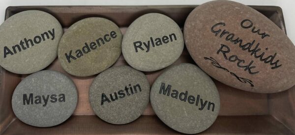 Family Rocks A wood box full of seven engraved rocks that have names of everyone in the family.