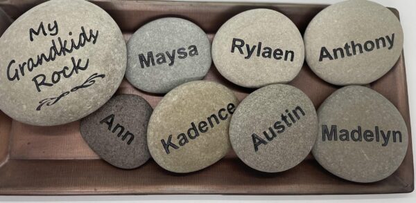Family Rocks A wood box full of eight engraved rocks that have names of all the grandkids.
