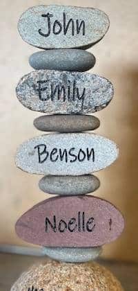 5 tier stacker with engravings John, Emily, Benson, and Noelle.