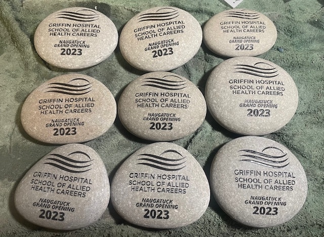 nine engraved stones that all say Griffin Hospital School of Allied Health Careers, Naugatuck grand opening 2023.