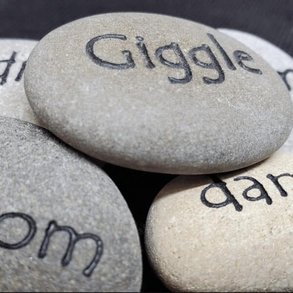 Pocket rocks with engravings giggle and dance