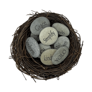 Bird nest containing 9 individual engraved stones