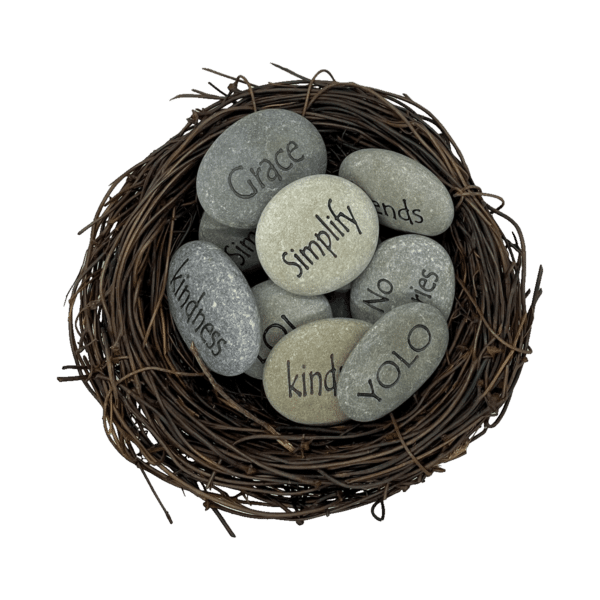 Bird nest containing 9 individual engraved stones