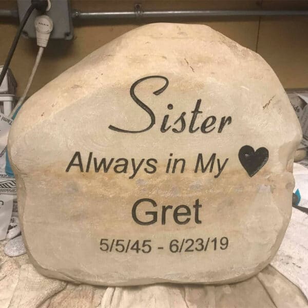 Custom tan rock engraving that says sister always in my heart, Gret
