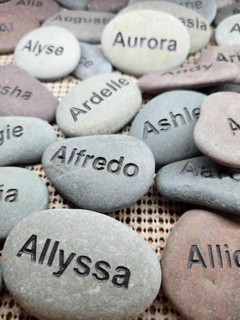 Many small engraved name rocks