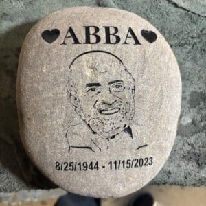 custom engraved rock with text abba with personal engraved image of the person